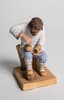 POPOV’S PORCELAIN SCULPTURE ‘A PEASANT MAN WEAVING LAPTI’
Moscow, Gorbunovo, A.G. Popov's Factory, circa 1850s-1860s
