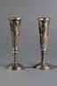 A PAIR OF RUSSIAN SILVER-GILT CHAMPAGNE FLUTES DECORATED WITH A MOTIF OF DANCING MUSES HOLDING HARPS
Maker’s mark of Alexander Mukhin on one and PAM on the second, 19th century