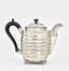 A silver coffee pot