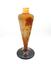 EMILE GALLE (1846-1904)
Orange vase with vine leaves