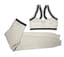 CHANEL
A stretch white sports set comprising white and black top