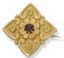 BROCHE ANTIQUE EN OR JAUNE 18K AVEC GRENAT, FIN 19EME SIÈCLE - DÉBUT 20EME SIÈCLE