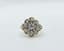 FLOWER DIAMOND RING
18k white gold ring set with one central brilliant-cut diamond weighing apporx. 0,18ct surrounded by rose-cut diamonds