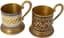 PAIR OF SOVIET METAL AND ENAMEL TEA GLASS HOLDERS
Leningrad Jewellery Factory, 1958
