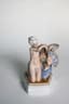 GERHARD HENNING (1880-1967)
ROYAL COPENHAGEN figurine 'Fairytale I, seated nude'