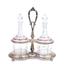 A SILVER AND GLASS CRUET SET, CARL
BECKER, C. 1910
Silver, glass