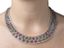 COLLIER AJOURÉ EN OR GRIS 14K, DIAMANTS, RUBIS, SAPHIRS ET ÉMERAUDES