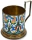 SOVIET SILVER-GILT AND ENAMEL TEA GLASS HOLDER
Leningrad Jewellery Factory, 1954