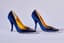 DOLCE & GABBANA
Navy blue velvet high heels with embroidered logo