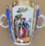 DOUBLE HANDLED PORCELAIN CUP AND SAUCER, 19th century
