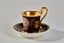 [LOUIS-ALEXANDRE BERTHIER (1753 - 1815)]
PORCELAIN JASMIN SHAPED CUP WITH GRISAILLE DECORATION OF A MAN DRIVING A CHARIOT AND SAUCER
Porcelaine de Paris, circa 1800s