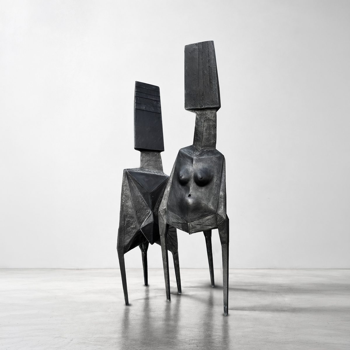 High Hat Man and High Hat Woman by Lynn Chadwick — front view