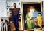 FERNANDO BOTERO (Born 1932)
Autograph photograph. Portrait of the artist with his paintings