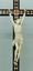 18TH CENTURY CRUCIFIX: A CARVED IVORY FIGURE OF CHRIST ON A CROSS INLAID WITH MOSAIC WOOD VENEER AND IVORY RESTING ON A TORTOISE SHELL BASE MOLDED WITH GUILLOCHET