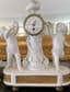 FIREPLACE CLOCK DECORATED WITH PUTTI AND GARLAND OF FLOWERS, 18TH CENTURY
