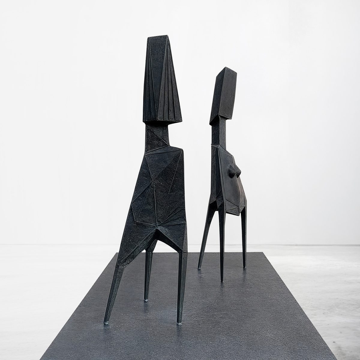 High Hat Man and High Hat Woman — side view on the base
