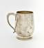 A silver presentation mug of Queen Victoria with a monogram ‘ALL» under the crown and inscription ‘FROM GRANDMAMA VICTORIA RI 29 June 1889’