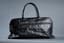 CHANEL
Black quilted caviar leather weekend travel bag