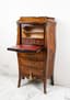 A LOUIS XV STYLE DROP-FRONT SECRETARY DESK WITH FLORAL MARQUETRY DECORATION, CURVED UPRIGHTS, GILDED AND CHASED BRONZES AND FOUR LOWER DRAWERS