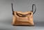 HERMÈS 
HANDBAGS LINDY CAMEL