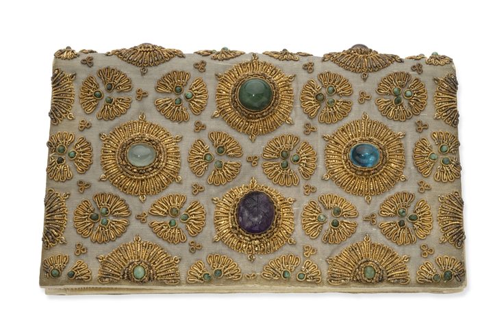 VAN CLEEF & ARPELS
SILK EVENING CLUTCH EMBROIDERED WITH GOLD THREADS AND SET WITH AMETHYST, JADEITE AND CHRYSOPRASE CABOCHONS, CIRCA 1950- 60S