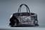 CHANEL
Black quilted caviar leather weekend travel bag
