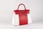 HERMÈS KELLY 35 LIMITED EDITION ‘FLAG OF MONACO’
ROUGE CASAQUE AND WHITE EPSOM LEATHER WITH PALLADIUM HARDWARE CIRCA 2019