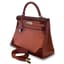HERMÈS KELLY GHILLIES 32 RETOURNE
Limited edition, rosy and Rouge Swift Leather, 2013