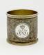 One silver napkin ring decorated with blackening and architectural views of the Moscow Kremlin and the monogram of Grand Duchess Olga Nikolaevna.