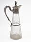 NEOCLASSICAL STYLE SILVER-GILT AND CARVED CRYSTAL DECANTER WITH DOLPHIN-SHAPED HANDLE
Europe, mid - late 19th century. Imported into Russia in the last quarter of the 19th century, it was used in Russian households.