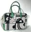 HERMES
PLUME 32 BAMBOO TOGO LEATHER AND TOILE BRIDE DE GALA EN DESORDE, PALLADIUM HARDWARE, 2014