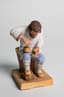 POPOV’S PORCELAIN SCULPTURE ‘A PEASANT MAN WEAVING LAPTI’
Moscow, Gorbunovo, A.G. Popov's Factory, circa 1850s-1860s
