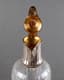 A PAIR OF FRENCH SILVER GILT AND CARVED GLASS DECANTERS ADORNED LIDS WITH PINECONE FINIAL