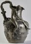 ALEXANDRE VIBERT (CIRCA 1847-1909)
ART NOUVEAU PEWTER PITCHER DECORATED WITH A NUDE HOLDING A NET