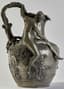 ALEXANDRE VIBERT (CIRCA 1847-1909)
ART NOUVEAU PEWTER PITCHER DECORATED WITH A NUDE HOLDING A NET