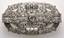 Brooch 1930's
Platinum set with diamonds. Circa 5cts. Central diamond 0,5ct. Weight: 18,00 grs